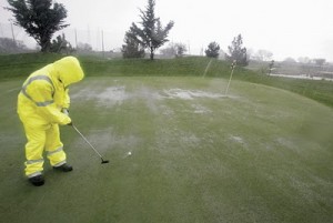a veery wet golfer